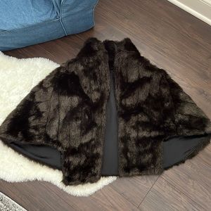 Brown fur caplet shall